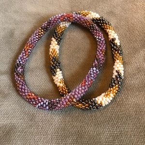 Pretty neutral  and purple beaded bracelet set💜🧡